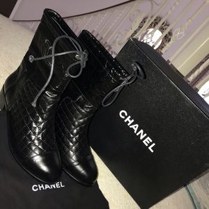 Chanel leather quilted combat boots.